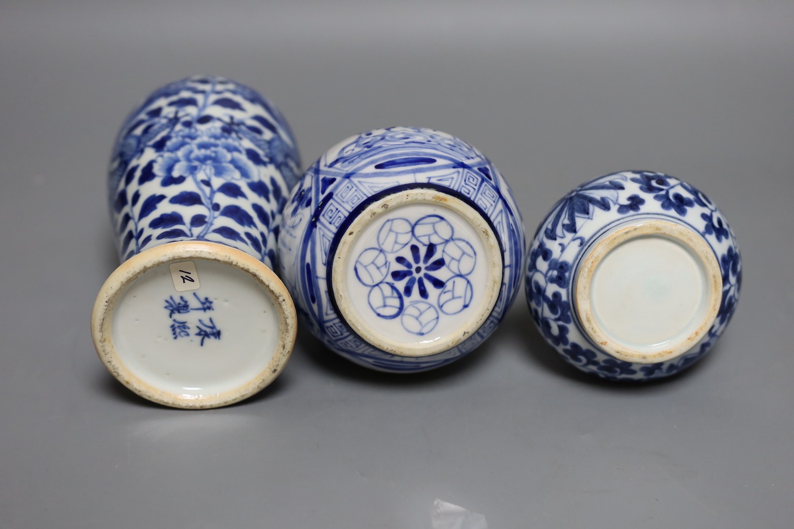 A Chinese blue and white ‘Dragon’ baluster vase and two blue and white bottle vases, 19th century and later, Tallest 21 cms.